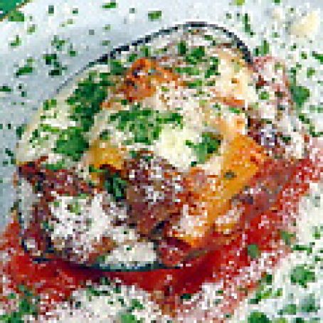 Baked Acorn Squash Filled with Italian Sausage and Rigatoni PastaEm