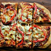 Spicy Three Cheese + Italian Sausage and Red Pepper Pizza