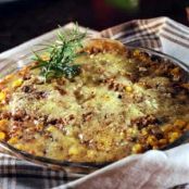 TOSTADA DE BUDIN DE CARNE Y FRIJOLES FRITOS