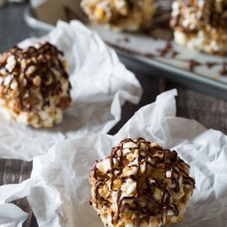 Toffee Pecan Popcorn Balls with Chocolate Drizzle