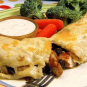 Chicken and Black Bean Enchiladas with Gooey Jack Cheese