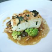 Pan-Roasted Pacific Halibut, Sicilian Cauliflower, Capers, Raisins, Orange Brown Butter