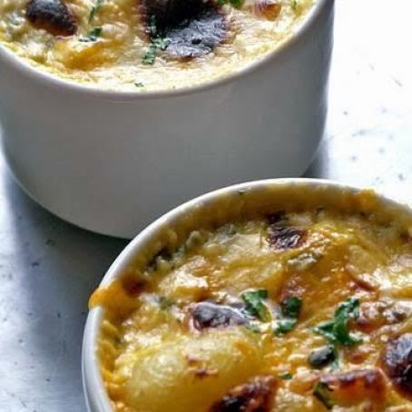 Baked Gnocchi and Cheese with Prosciutto and Herbs