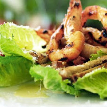Classic Caesar salad with BBQ chilli prawns