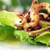 Classic Caesar salad with BBQ chilli prawns