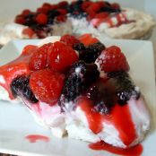 Pavlova with Fresh Summer Berries & Raspberry Coulis Sauce