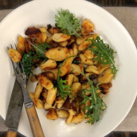 Fried Potato Dumplings With Baby Kale