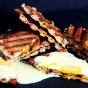 Ham and Cheese Stuffed Waffles topped with Fried Eggs and Hollandaise - Nancy's Cravings