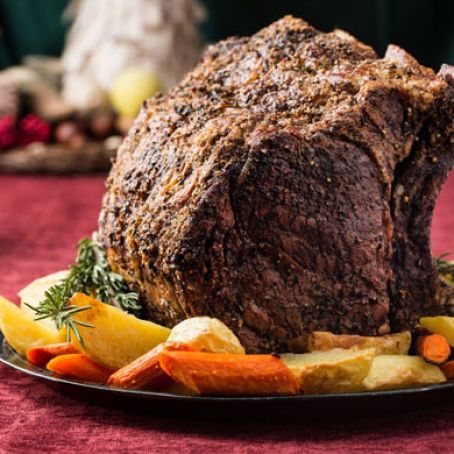 Herb-Crusted Beef Rib Roast with Potatoes, Carrots, and Pinot Noir Jus