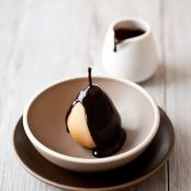 Spiced Poached Pears with Chocolate Sauce and Vanilla Ice Cream