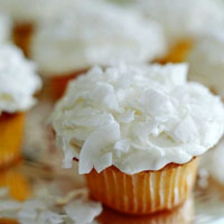 TANGERINE CUPCAKES WITH COCONUT FROSTING