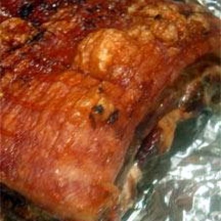 Belly of Pork slow roasted on a bed of Bramley apples recipe