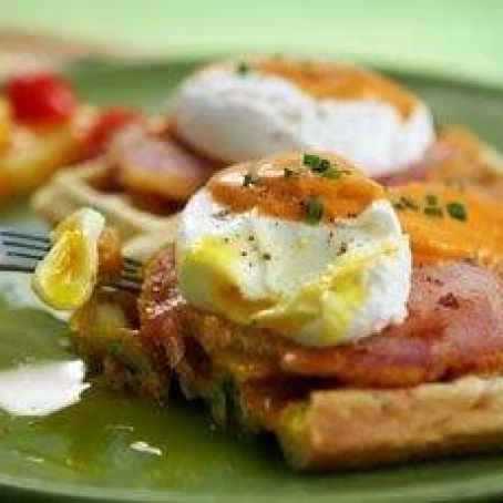 Eggs Benedict with Peameal Bacon, Tomato Cream Sauce, & Scallion Waffles
