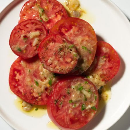 Sliced Tomatoes with Anchovy and Roasted Garlic Vinaigrette