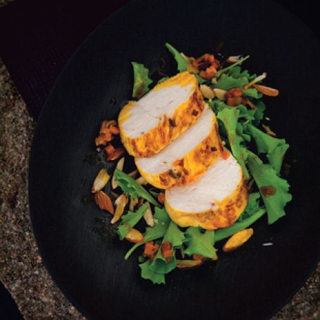 saffron-marinated chicken breast and baby greens salad
