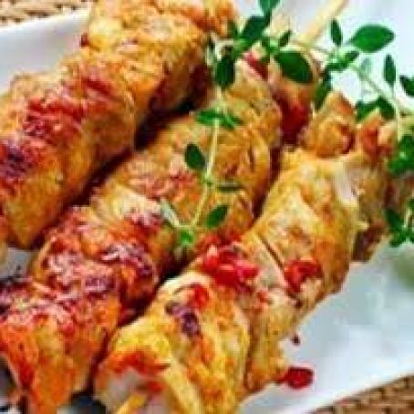 Skewered Alligator in Lime & Ginger Sauce