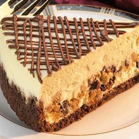Peanut Butter and Milk Chocolate Chip Layered Cheesecake