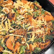 Farro bowl with roasted sweet potatoes, broccoli rabe and sausage