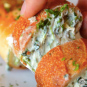 Spinach & Artichoke Dip Stuffed Garlic Bread