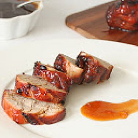 Chili and garlic rubbed pork tenderloin slathered with a sweet and sticky bbq apricot glaze