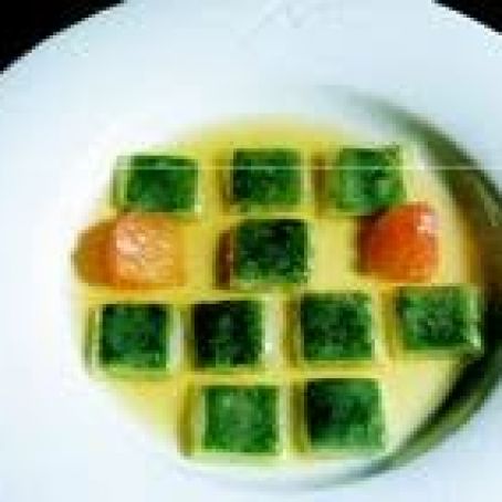 Iberian Bacon Ravioli with Basil and Tomato Consommé