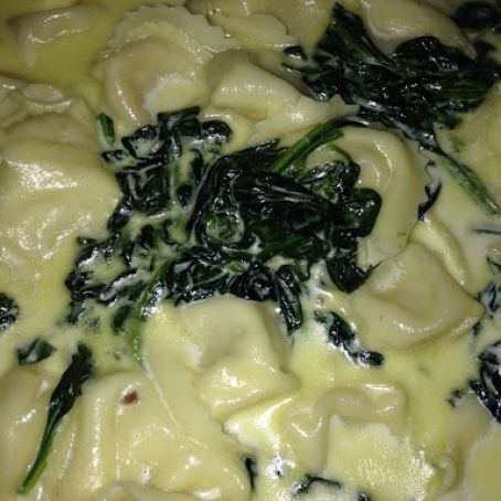 Ricotta and Spinach Tortelloni with Creamy Parmigiano Sauce