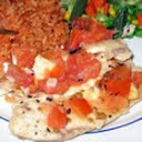 Easy tilapia with wine & tomatoes