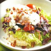 Creamy Grits with Frisée, Poached Egg, Crumbled Bacon, and Blue Cheese
