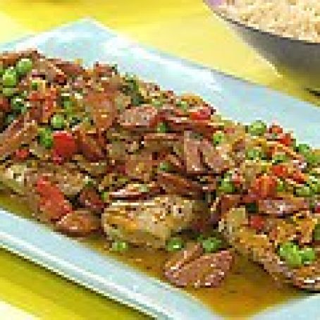 Chicken with Roasted Red Pepper, Chorizo and Sweet Pea Sauce over Rice