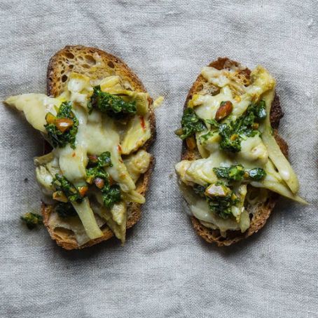Artichoke Dip Toasts with Spinach Pesto