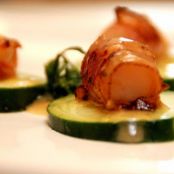 Prosciutto Wrapped Scallops Cucumber Slices with Thai Sesame Lime Drizzle