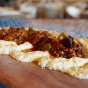Pork and Fennel Sausage Ragout with Parmesan Mascarpone Polenta (Cucina Urbana)