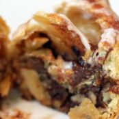 Pain au Chocolat Cinnamon Rolls with Crème Fraîche Icing and Walnuts