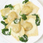 squash tortelli with spinach and fontina cream