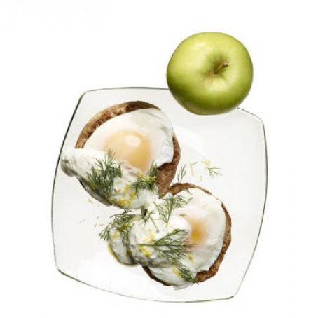 Eggs benedict and an apple