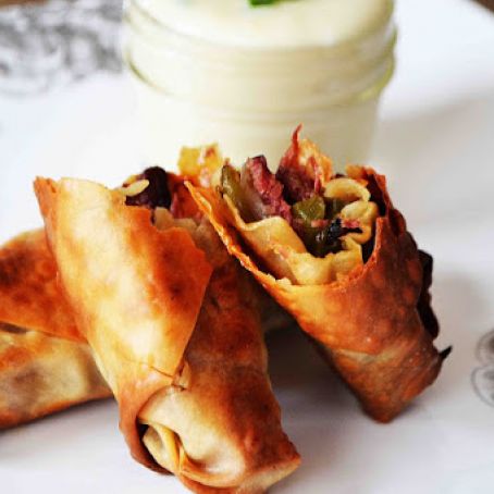 Steak Bomb Egg Rolls with a Horseradish Cheddar Dipping Sauce