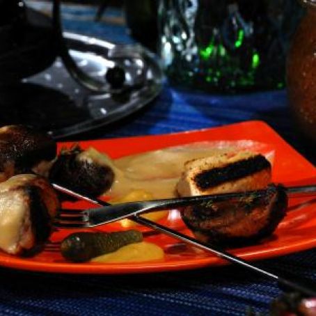 German Smoked Cheese and Beer Fondue with Beer-Simmered Bratwurst, Grilled Bacon, Mushrooms and Rye Bread