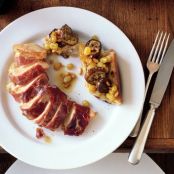 Prosciutto-Wrapped Chicken Breasts with Eggplant Panzanella and Raisin-Pine Nut Vinaigrette