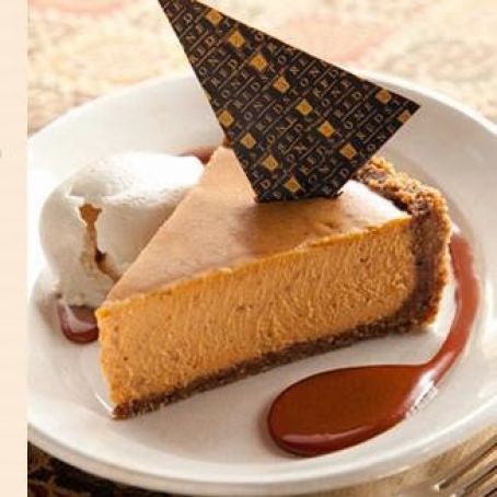 Pumpkin Cheesecake with Caramel Sauce & Whipped Cream