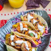Jerk Shrimp Tacos with Pineapple Salsa, Slaw and Pina Colada Crema