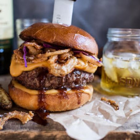 Jameson Whiskey Blue Cheese Burger with Guinness Cheese Sauce + Crispy Onions.