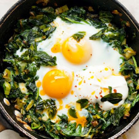 Skillet Baked Eggs with Spinach, Yogurt, and Chili Oil