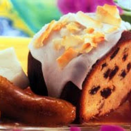 Rum Cake with Coconut Frosting and Flambéed Bananas