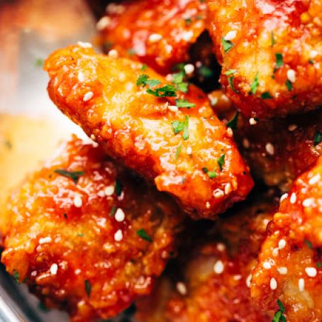 STICKY BAKED CHICKEN BITES IN HONEY SRIRACHA SAUCE