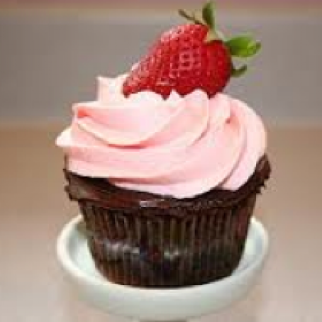 Chocolate Cupcakes Stuffed With Strawberry Chocolate Ganache And Frosted With Chocolate Glaze And Buttercream