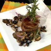 MEDALLONES DE RES CON SETAS AL AJILLO