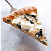 Thin-Crust Whole-Wheat Pizza with Garlic Oil, Three Cheeses, and Basil