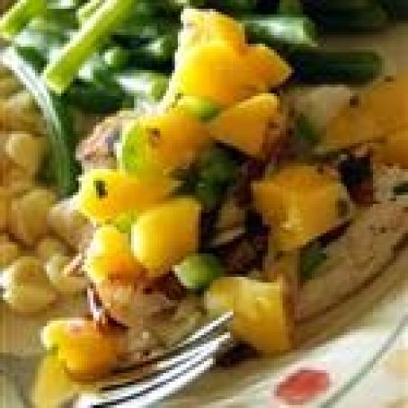 Grilled fish with mango salsa