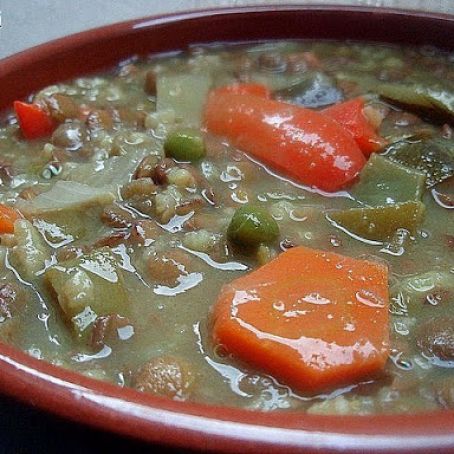 POTAJE DE LENTEJA CON ARROZ Y SALCHICHAS