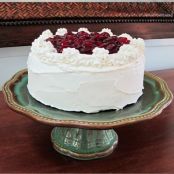 Cherry-Topped White Cake with Whipped Cream Frosting